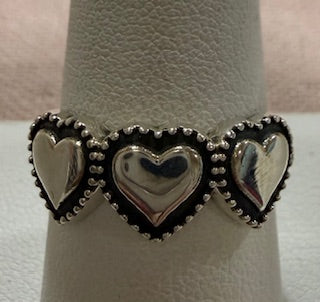 Ring, Sterling Silver Small triple heart band ring